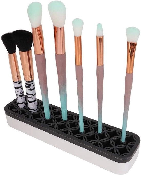 Organizzatore multifunzionale per pennelli e matite per makeup con contenitore in silicone.