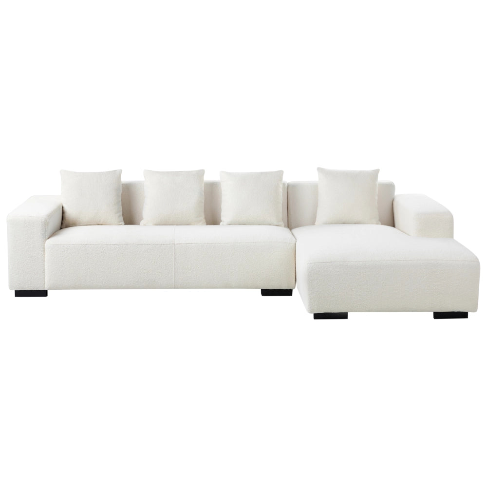 Divano angolare a L con cuscini 4 posti in tessuto bouclè bianco con ottomana versione a sinistra stile elegante moderno