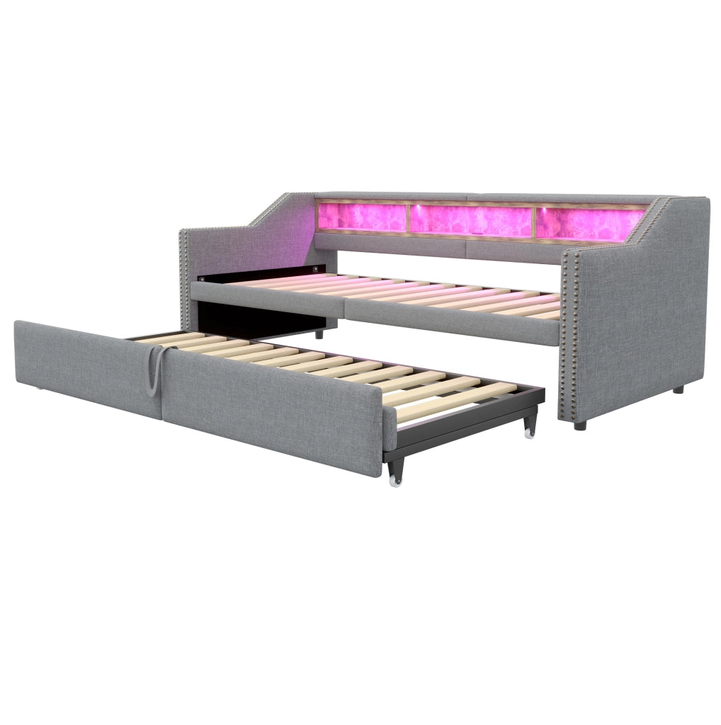 Divano letto 90x200 cm estraibile fino a 180x200 cm con vani portaoggetti; LED e USB grigio chiaro