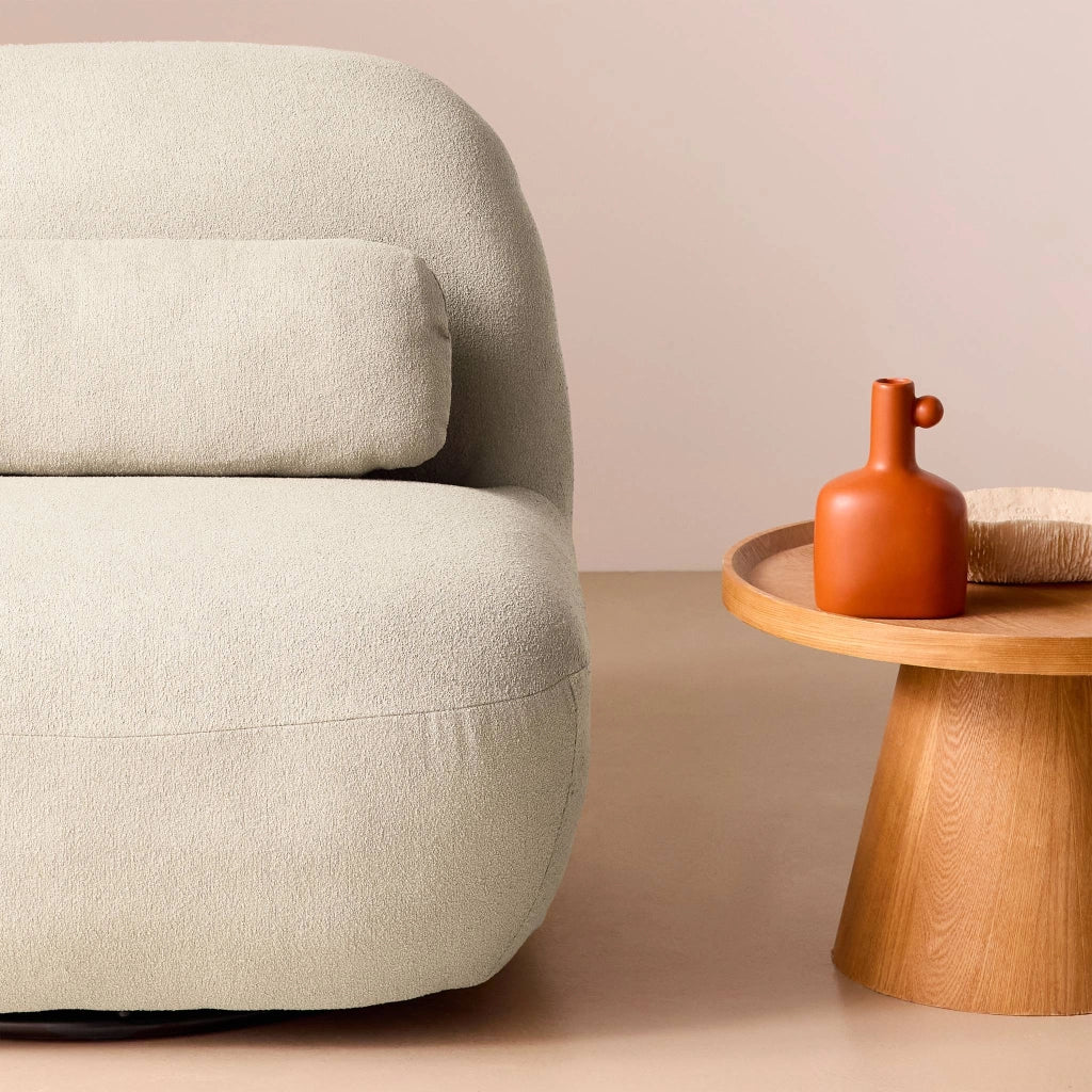 Poltrona girevole 360° bouclé, crema