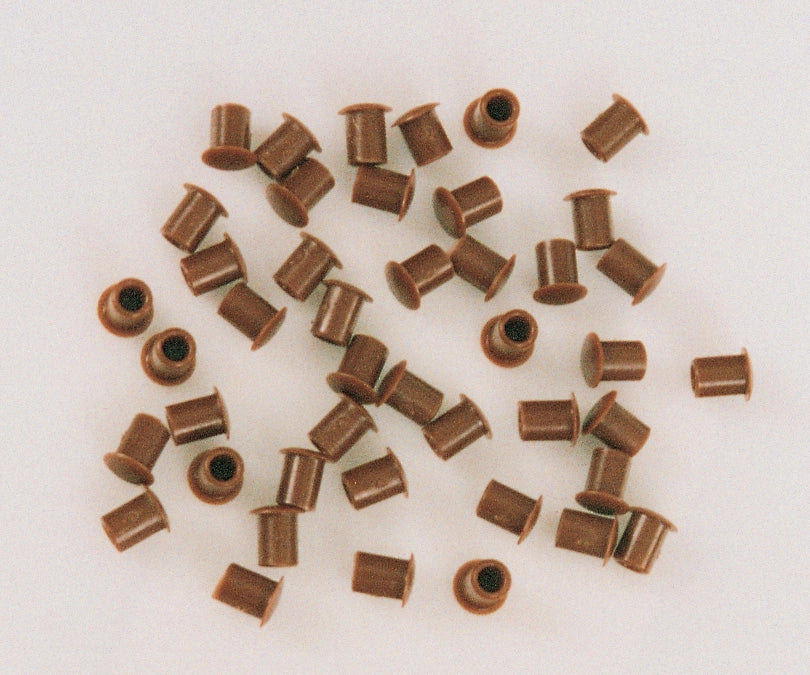 COPRIFORO PLASTICA MARRONE D 5 MM*- 1000,0 pz