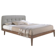Letto in tessuto grigio trapuntato