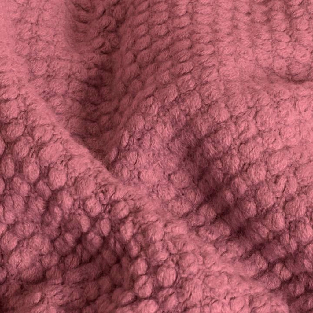 Coperta plaid rosa lampone testurizzata a nido d'ape e frangiata 180x220 cm