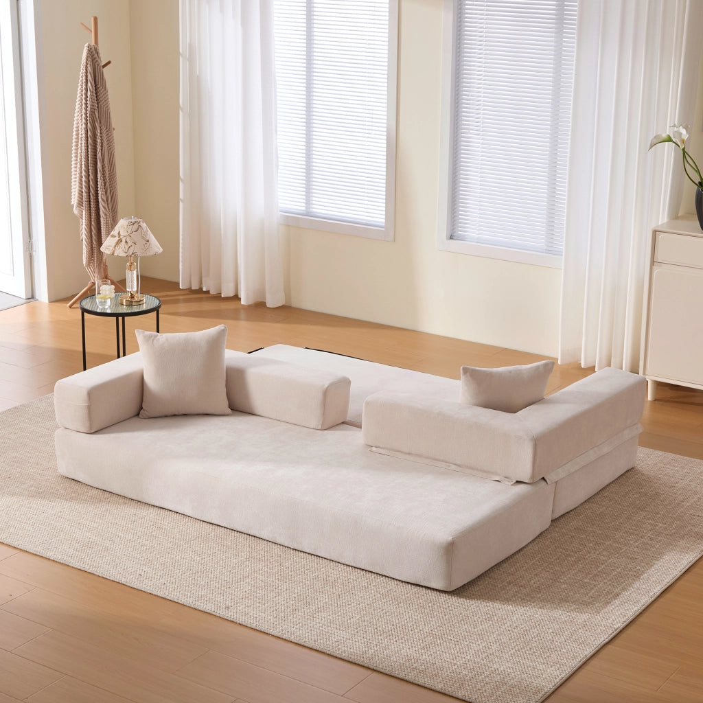 divano modulare in chenille con tasche laterali e base antiscivolo; beige