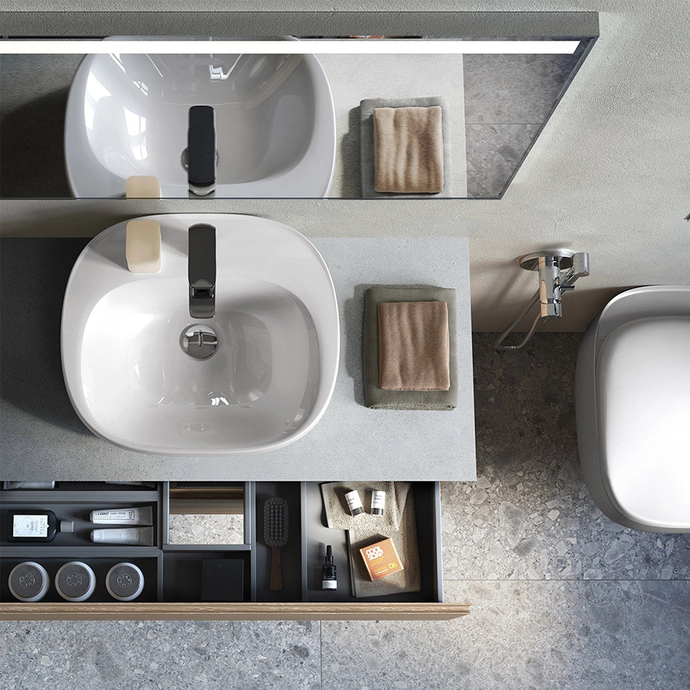 Lavabo ovale 60 cm d’appoggio bianco in ceramica Rak Illusion