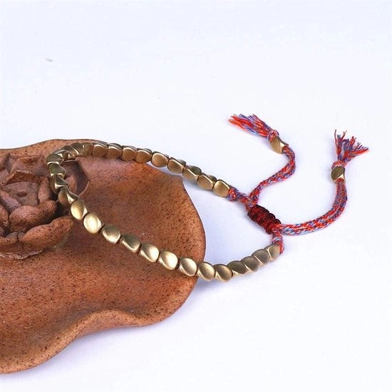 Armband artigianale tibetano buddista - Perle di rame irregolari