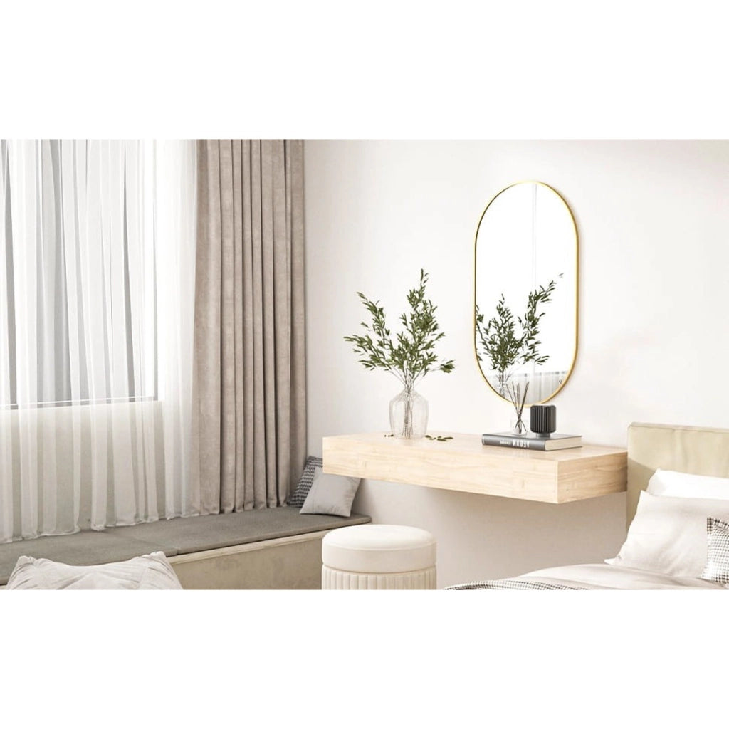 Specchio ovale da parete moderno con cornice dorata