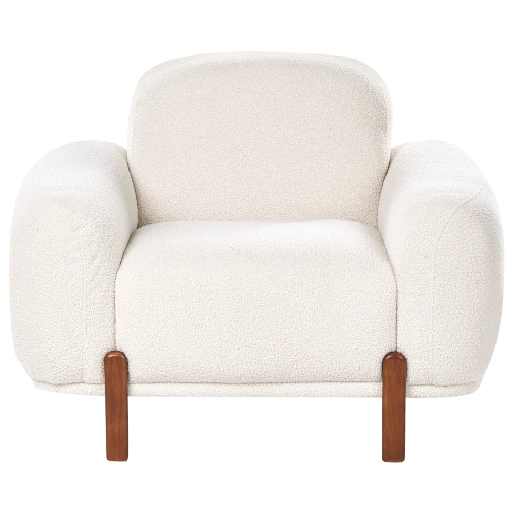 Poltrona bianca bouclé imbottita morbida moderna organica bassa curvilinea stile moderno