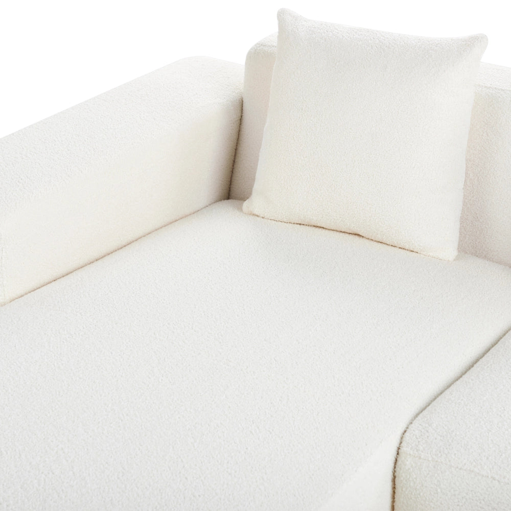 Divano angolare 4 posti in tessuto bouclè bianco lato destro forma a L stile elegante