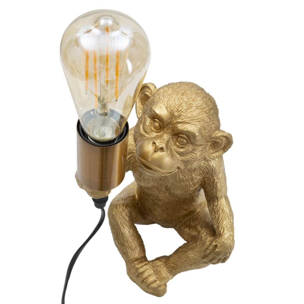 Lampada da tavolo Monkey in resina dorata