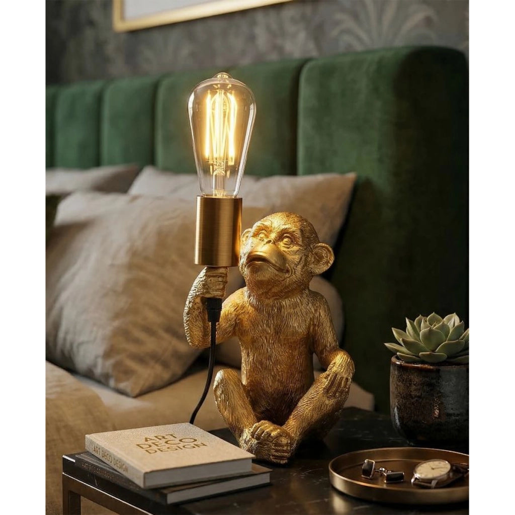 Lampada da tavolo Monkey in resina dorata
