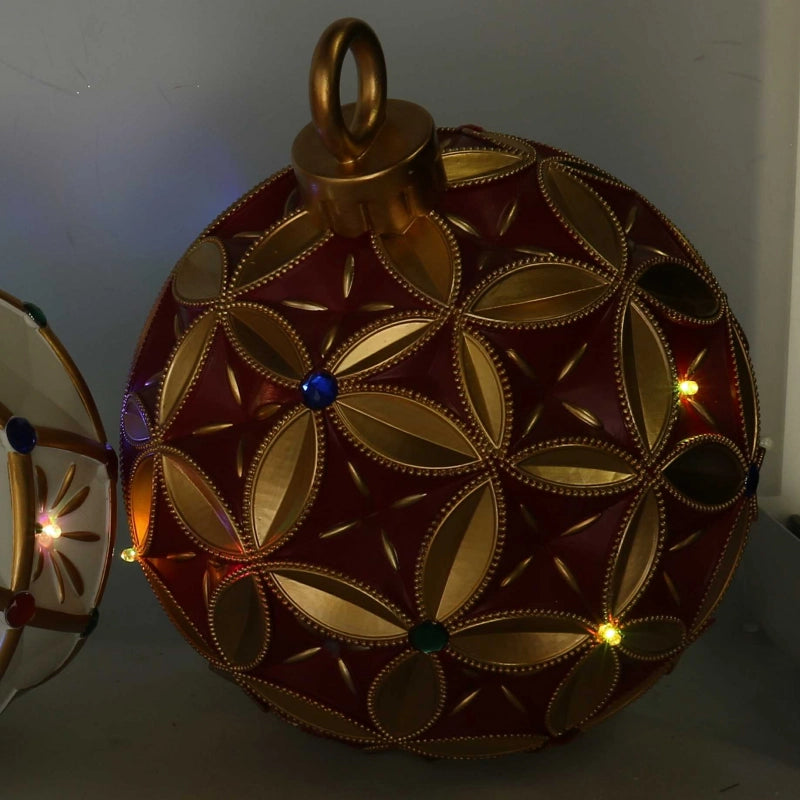 Sfera resina oro e con led rosso cm ø26h29,5
