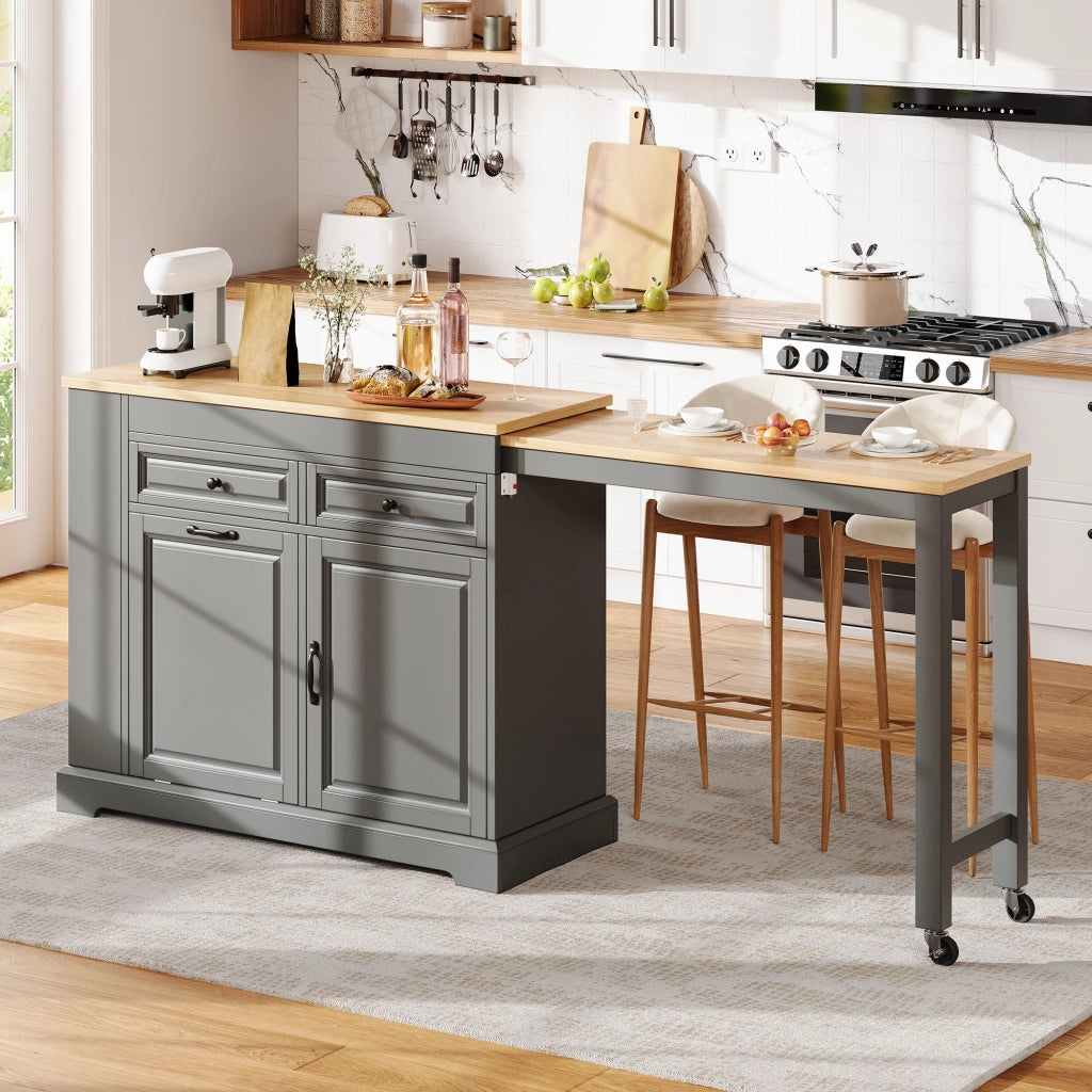 Isola da cucina su ruote con piano estraibile laterale da 112 a 180 cm; vano pattumiera e cassetti; grigio