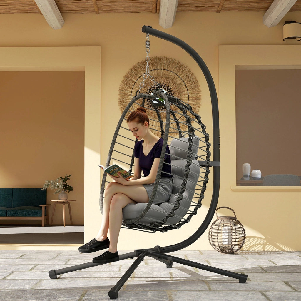 Poltrona sospesa pieghevole in rattan sintetico con supporto e cuscini, grigio